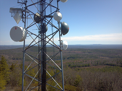 Communications tower and equipment with a view of New Hampshire